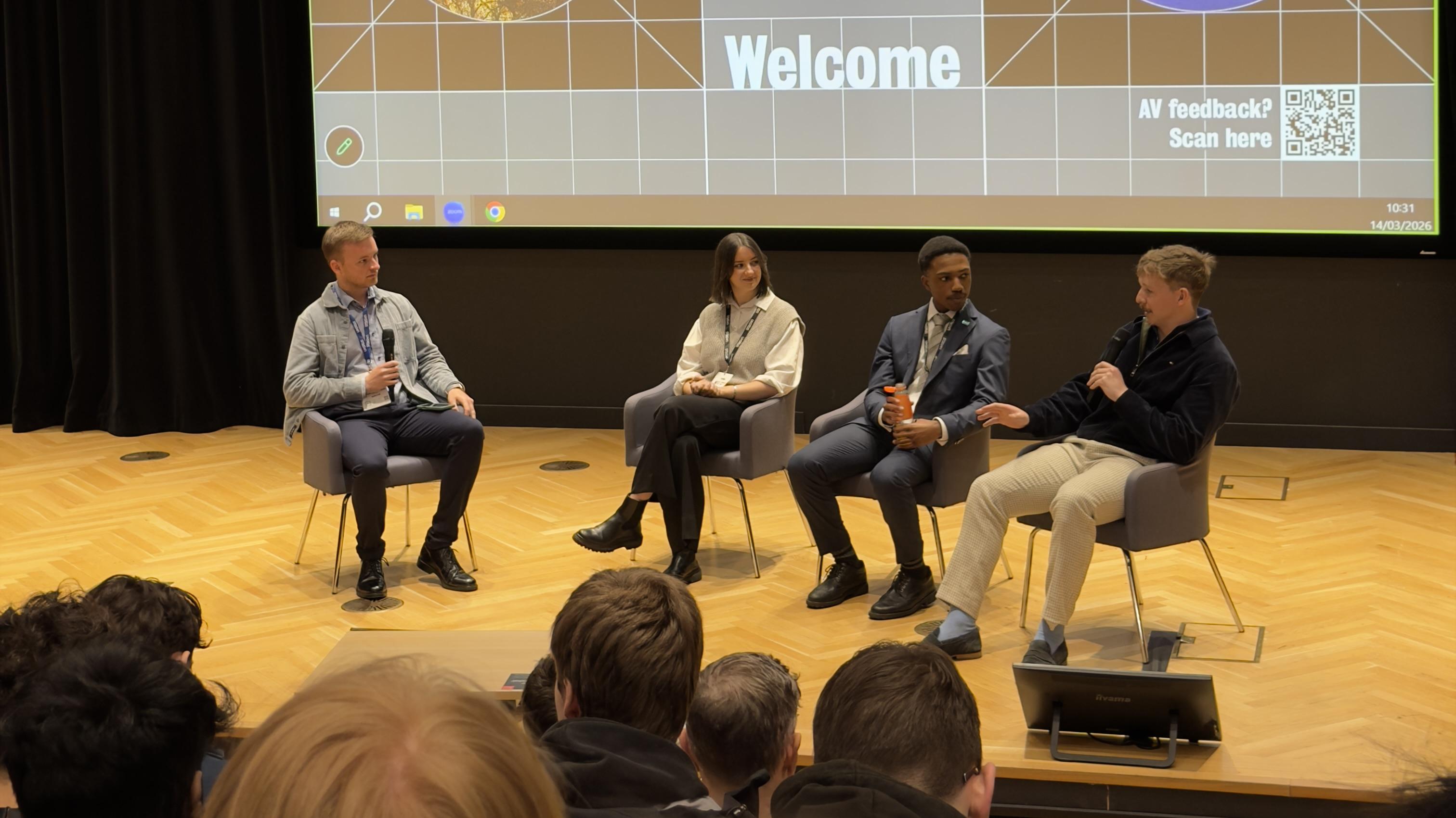 A panel hosted by 4 hosts each of different disciplines